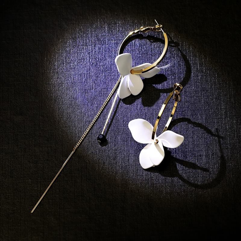 Mote Blomster Og Elegante Øredobber